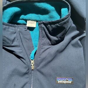 Patagonia Dark Blue Jacket with Teal Lining